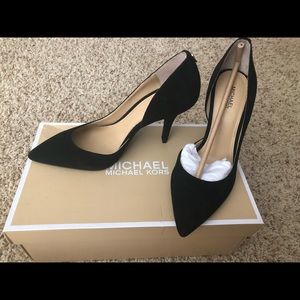 Black pumps. Never worn. Suede.